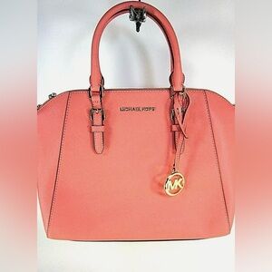 Large dome Michael Kors purse w/ convertible crossbody strap. Pink/orange Coral